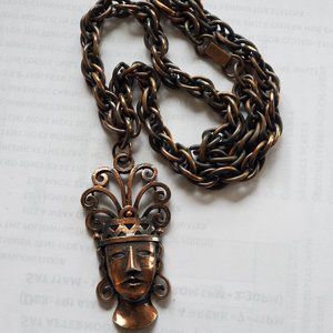 Rare unsigned Rebajes copper tribal face necklace